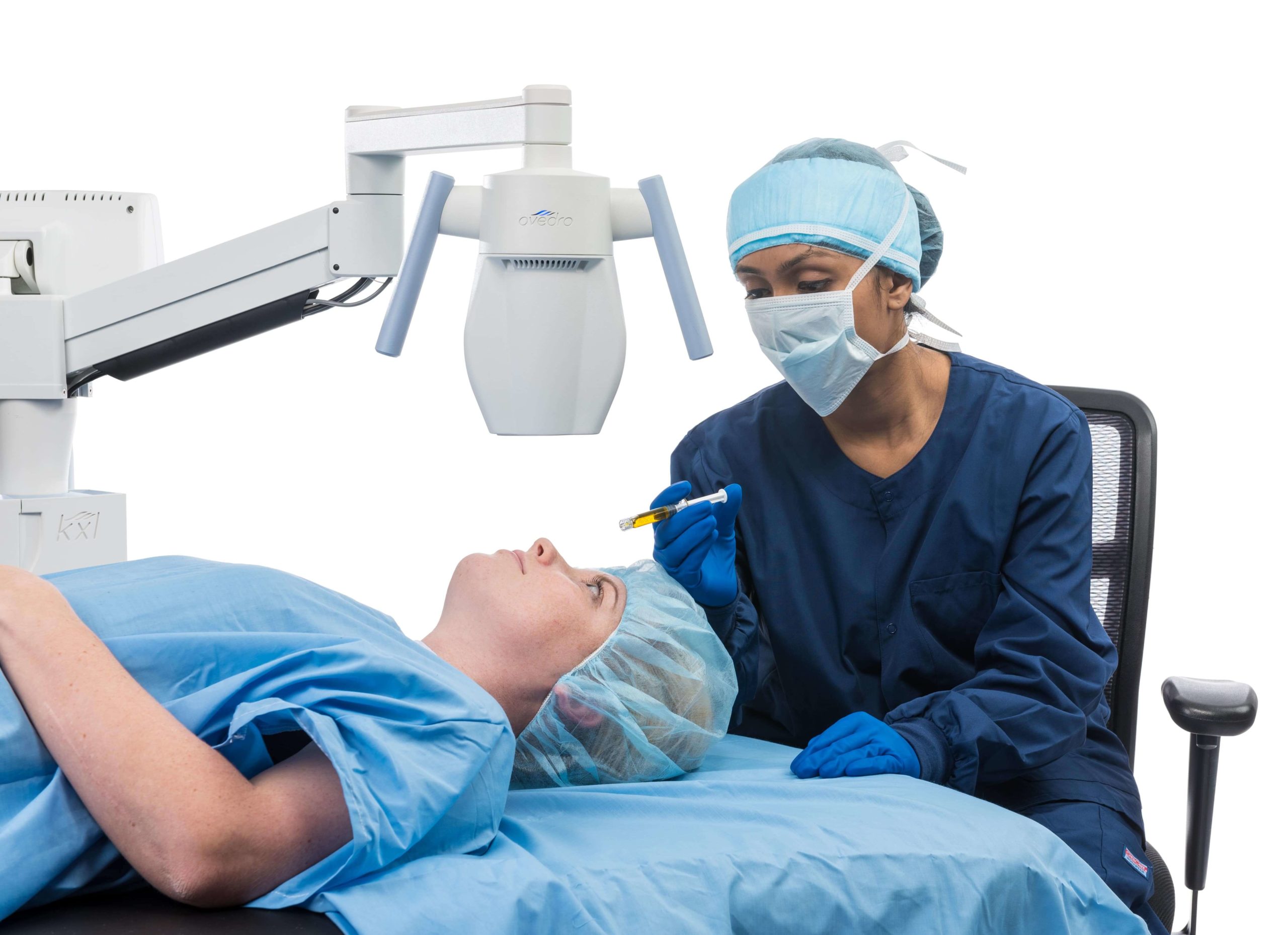 A patient and doctor with the KXL® system for performing cross-linking and Lasik Xtra®.